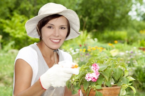 Protected gardeners completing a tidy and secure garden service